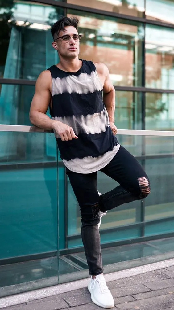 24 Men’s Pool Party Outfit Ideas 23 Sleeveless Muscle Tee with Patterned Bottoms